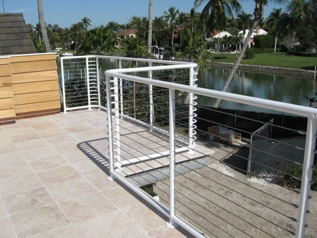 Stainless steel cable railing set in aluminum posts