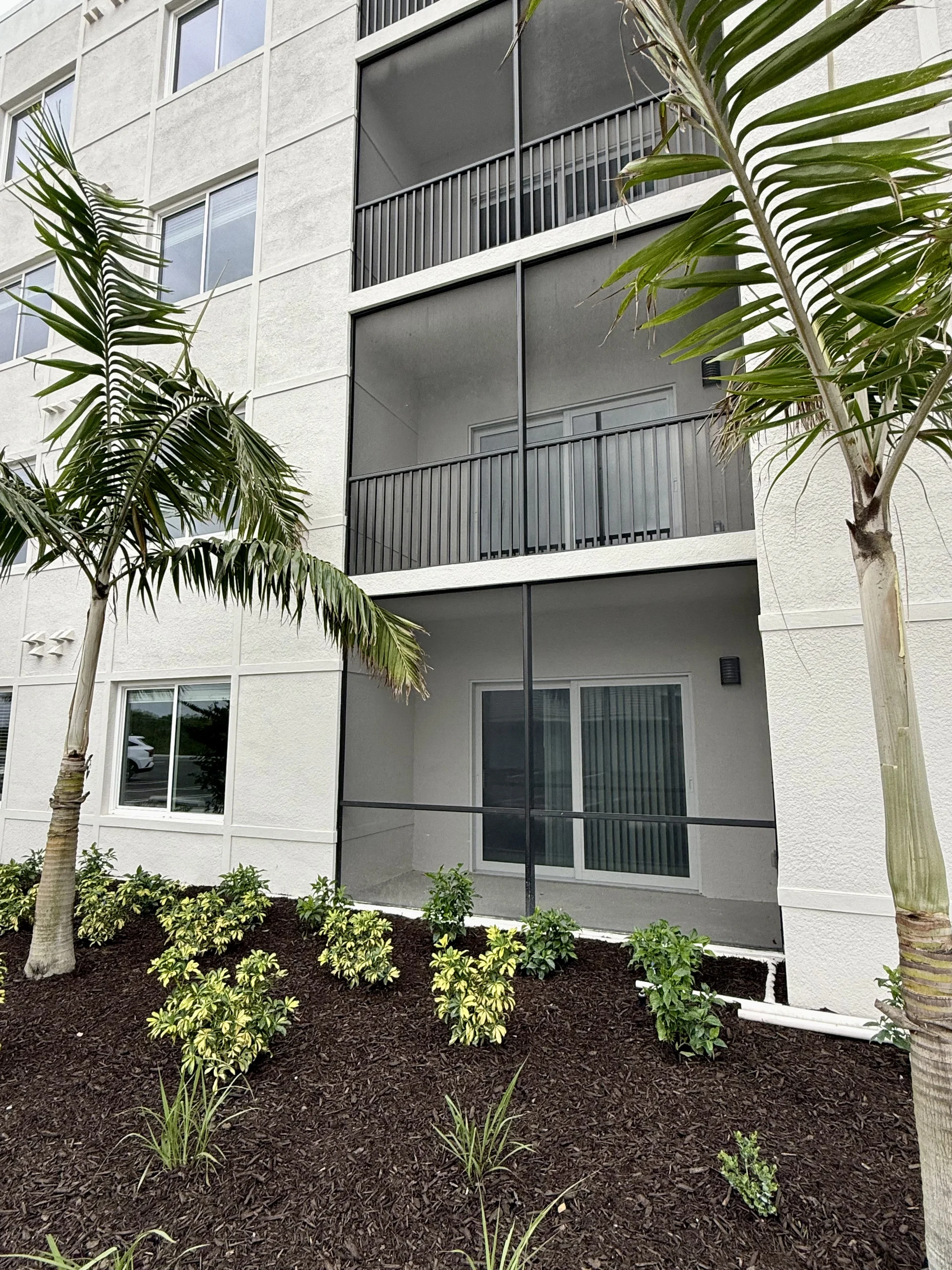 FL Star – Condo Screen – Hammock Park Apartments (3) Aluminum condo screen wall on a balcony at Hammock Park Apartments
