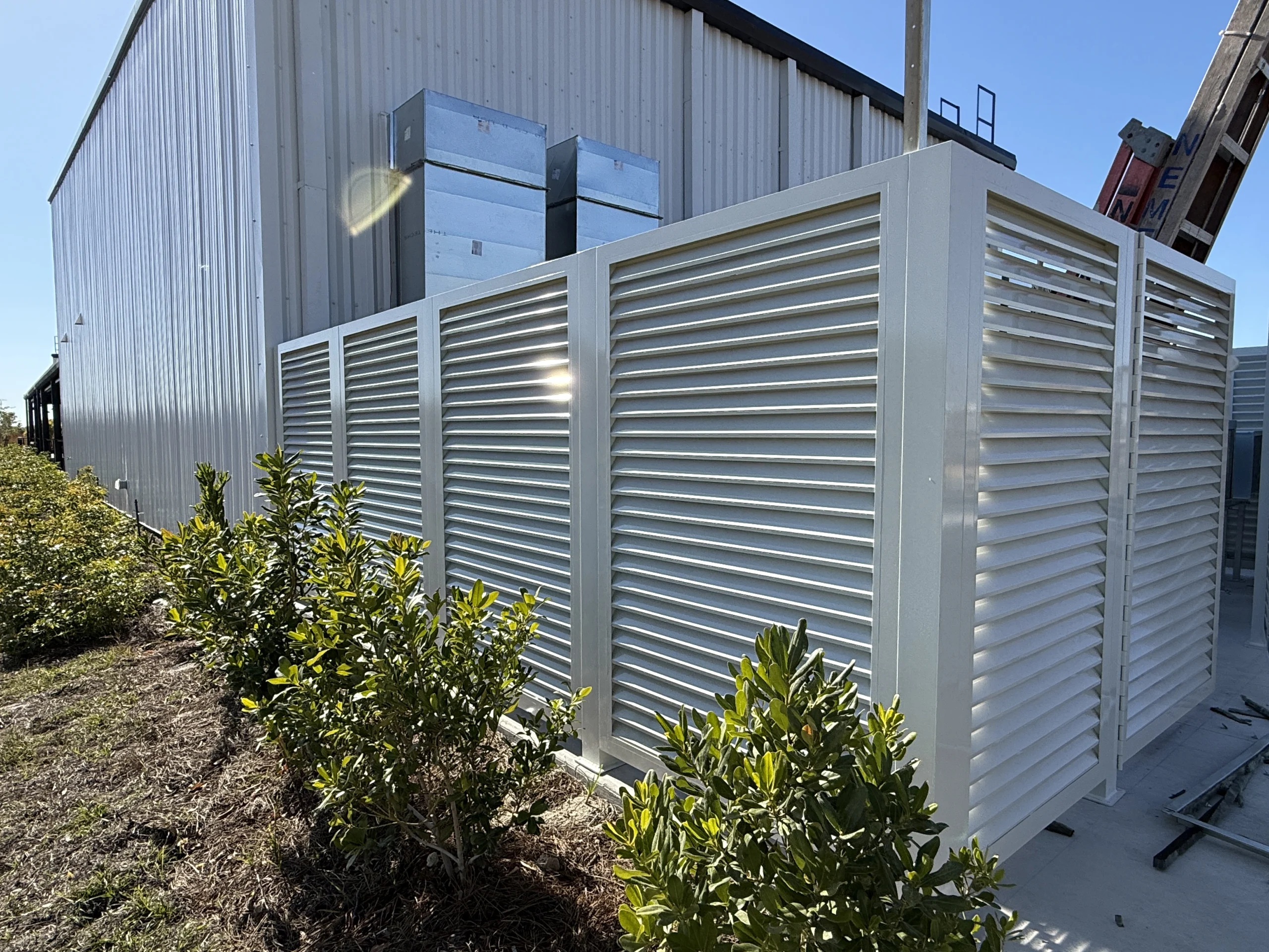 Resurgence Brewing – Seagate – Equipment Louvers (2) Aluminum equipment louver screening mechanical equipment fabricated for Resurgence Brewing